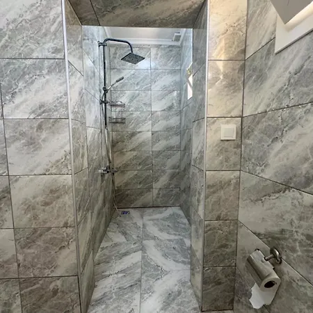 Aparthotel Guemuesluek *
